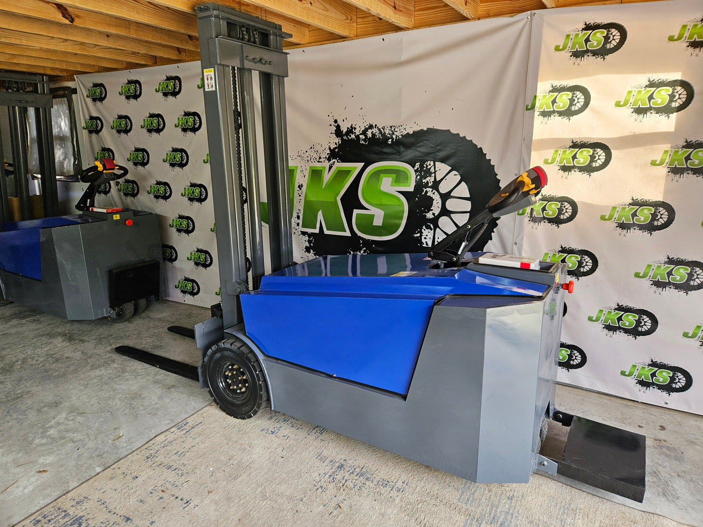 JKS All-Terrain E15 Stand Up Forklift "Big Blue"