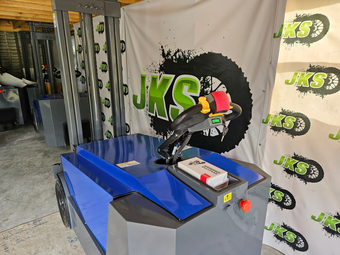 JKS All-Terrain E15 Stand Up Forklift "Big Blue"