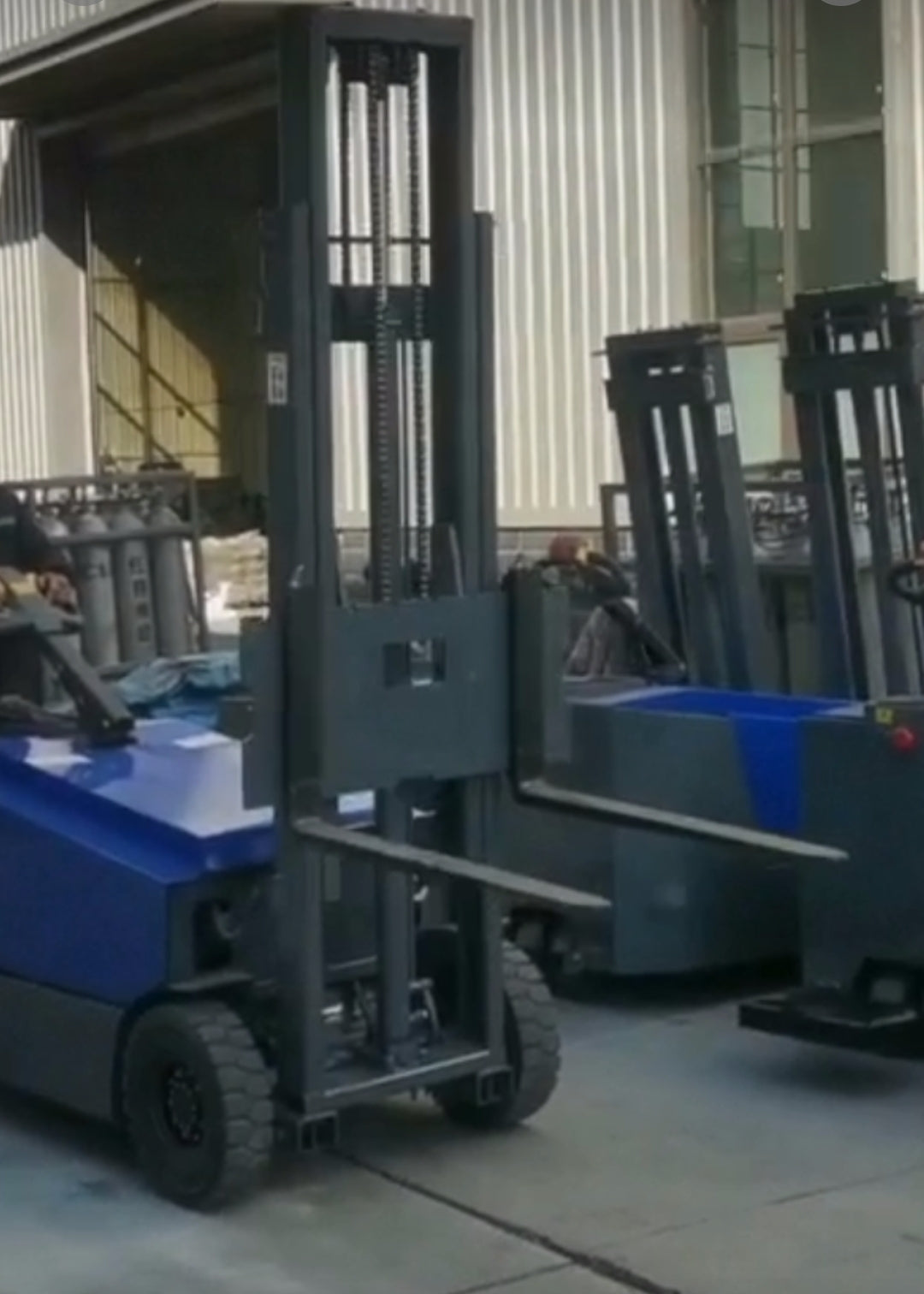 JKS All-Terrain E15 Stand Up Forklift "Big Blue"