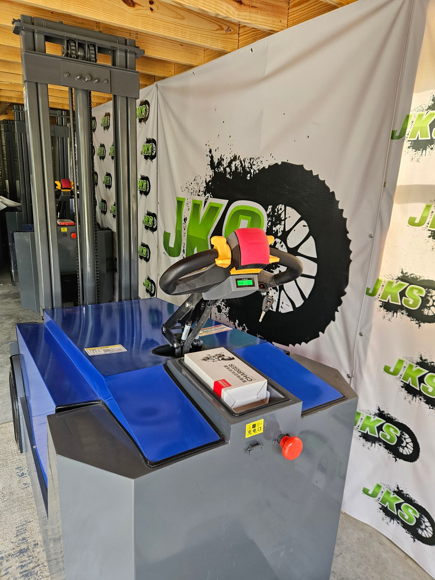 JKS All-Terrain E15 Stand Up Forklift "Big Blue"