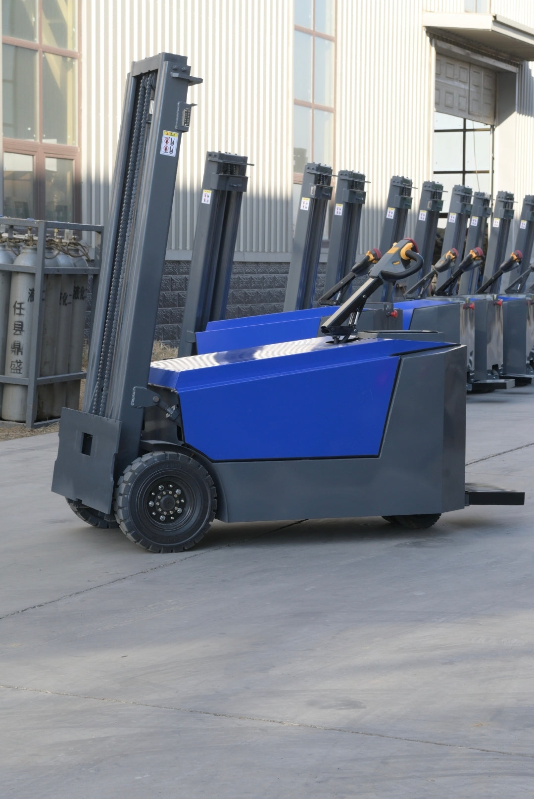 JKS All-Terrain E15 Stand Up Forklift "Big Blue"