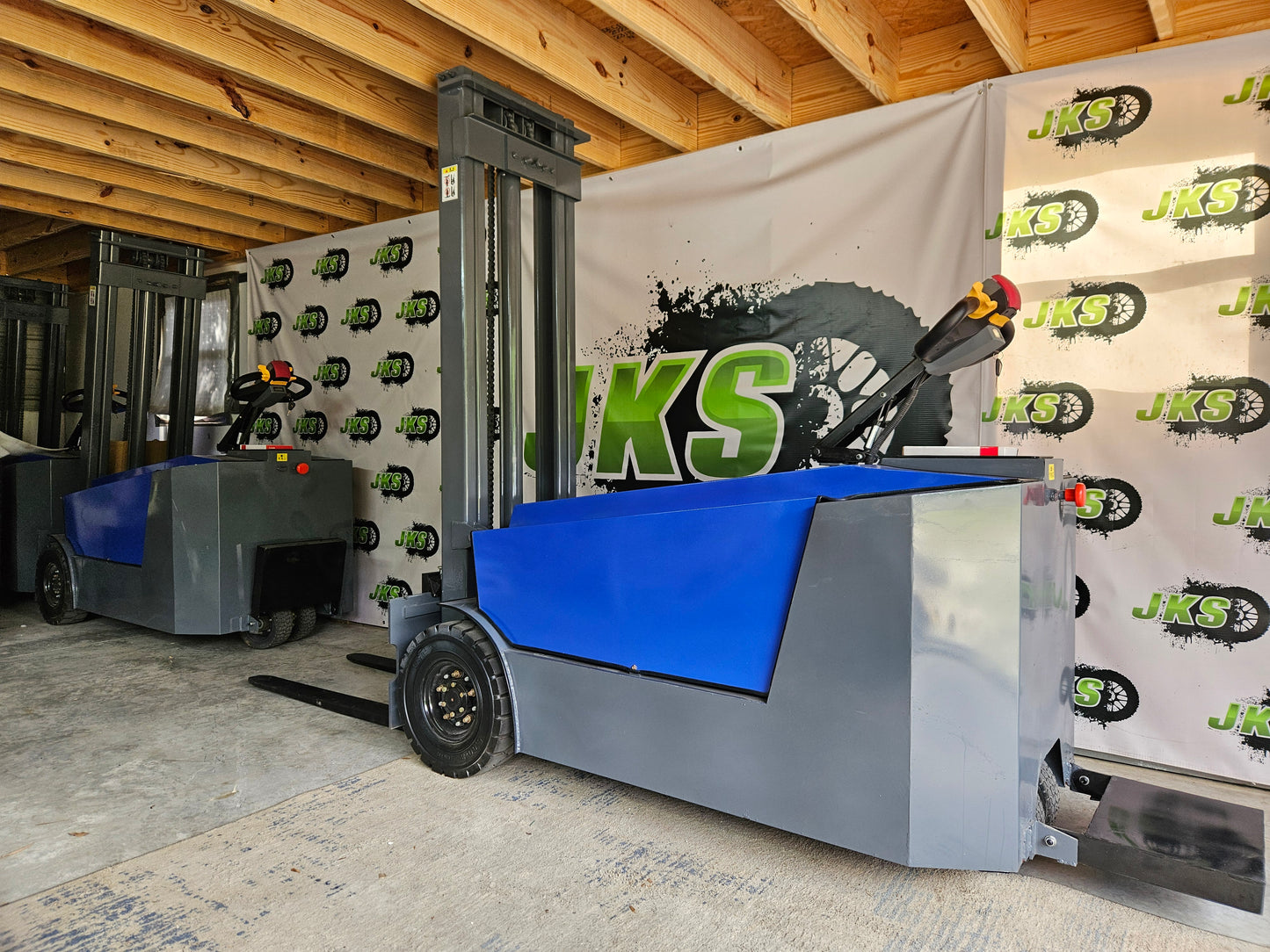 JKS All-Terrain E15 Stand Up Forklift "Big Blue"