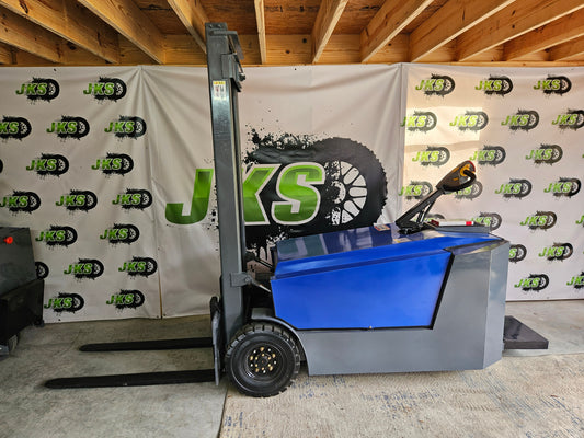 JKS All-Terrain E15 Stand Up Forklift "Big Blue"